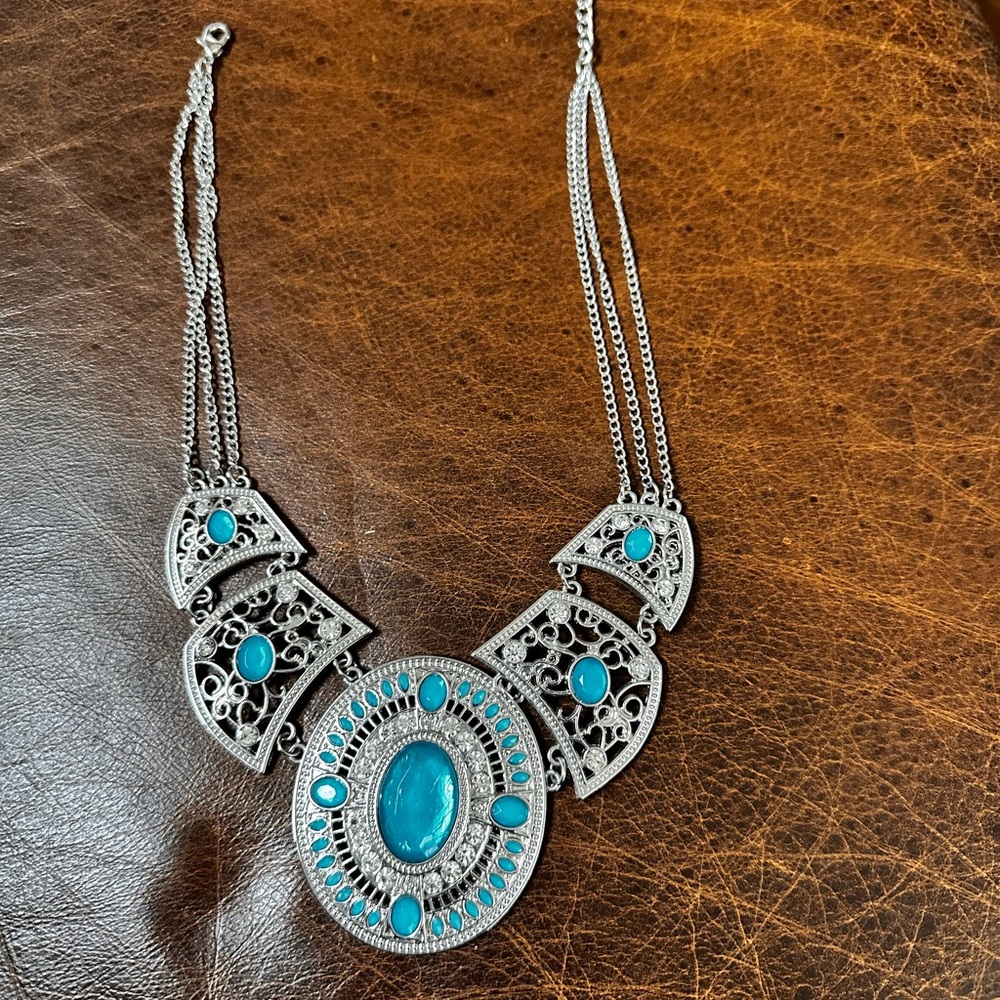 Intricate Silver Necklace with Turquoise color Accents